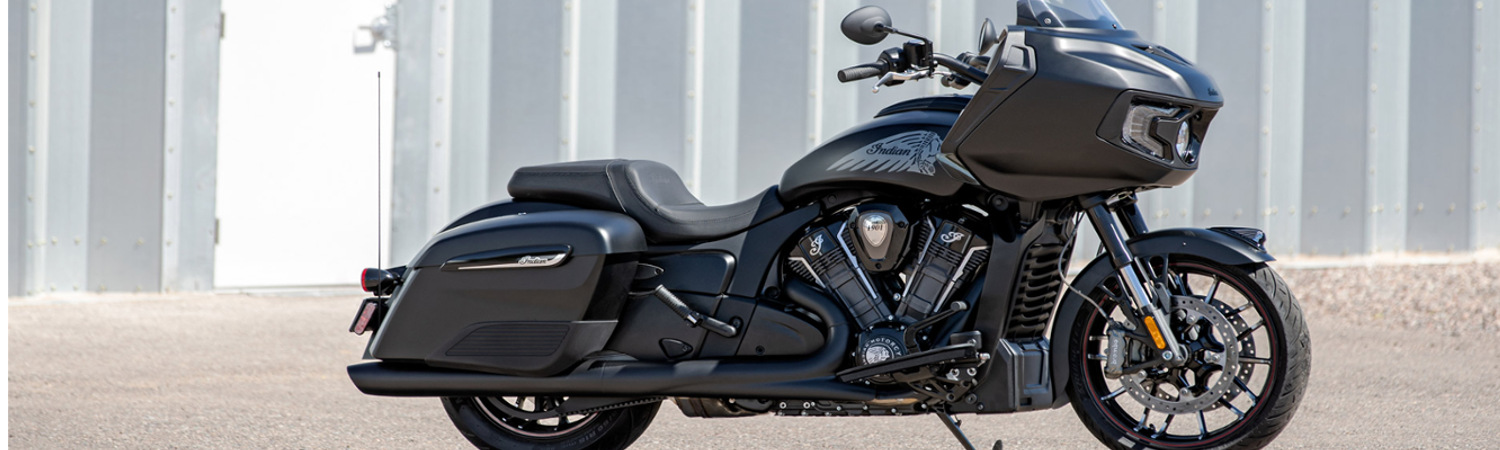 Black 2020 Indian Motorcycle® Challenger® parked in front of a building